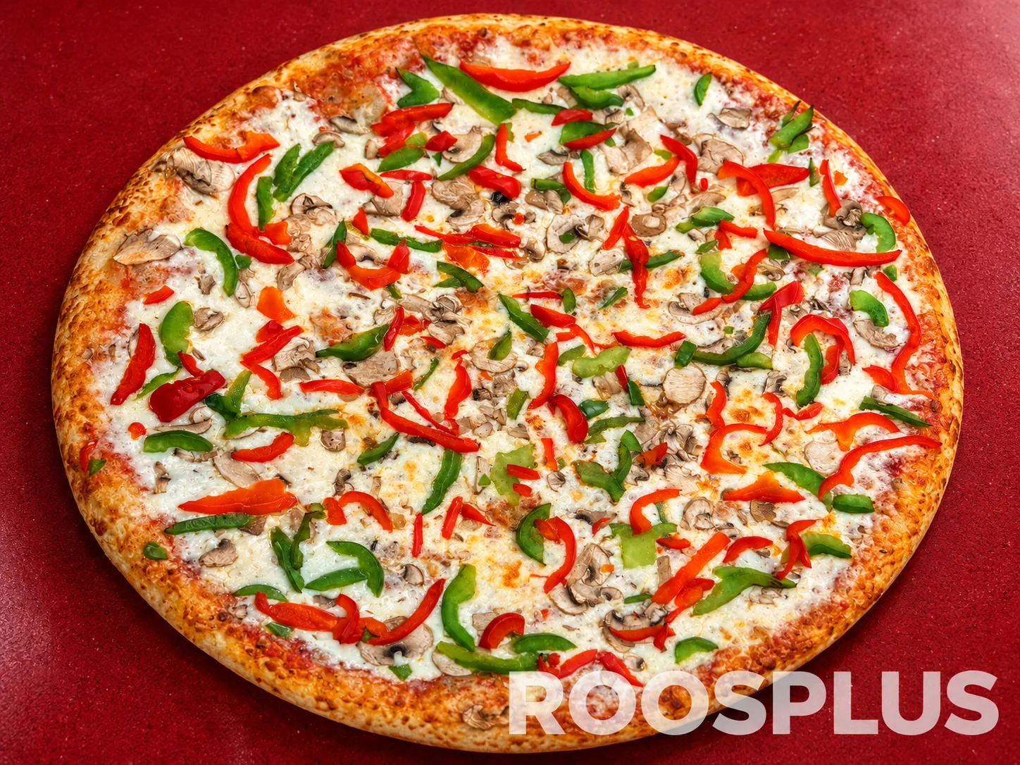 Pizza with melted cheese, sliced mushrooms, green peppers and red peppers at Bismillah Pizza, Eglinton Avenue East, Scarborough.
