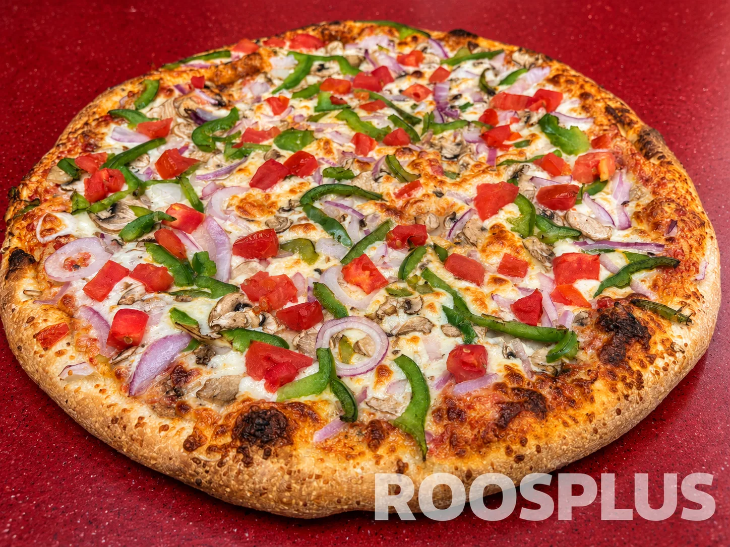 Pizza with tomatoes, green peppers, mushrooms, red onion and melted cheese at Bismillah Pizza, Eglinton Avenue East, Scarborough.