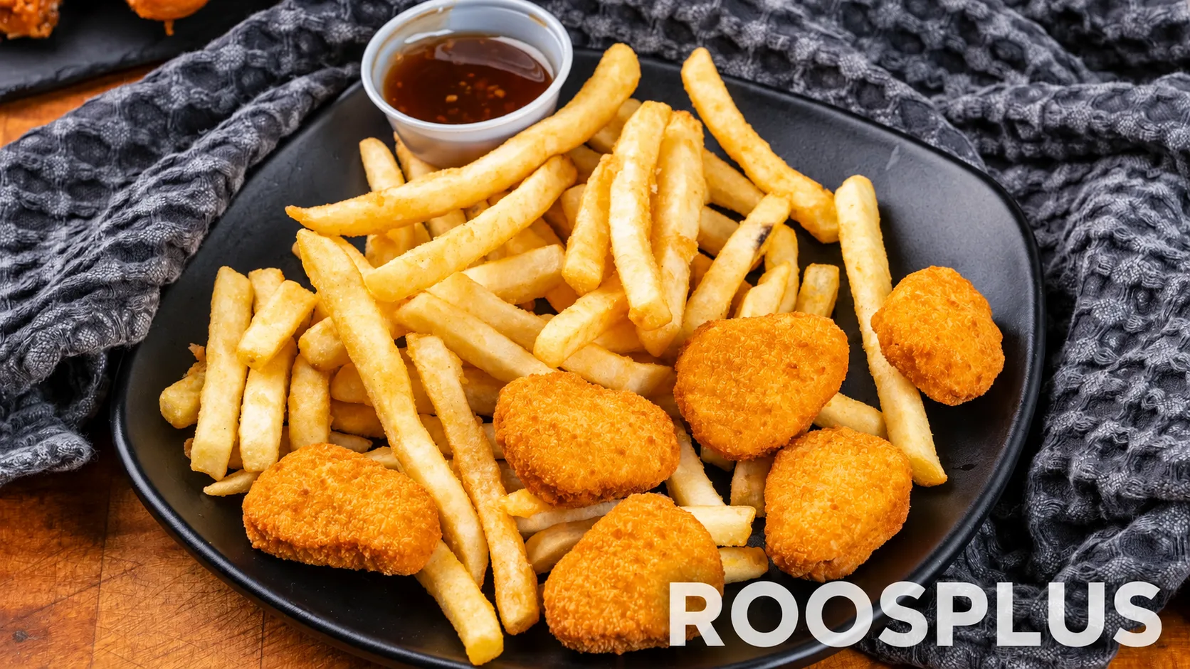 Breaded chicken nuggets served with French fries and a dipping sauce at Bismillah Pizza, Eglinton Avenue East, Scarborough.